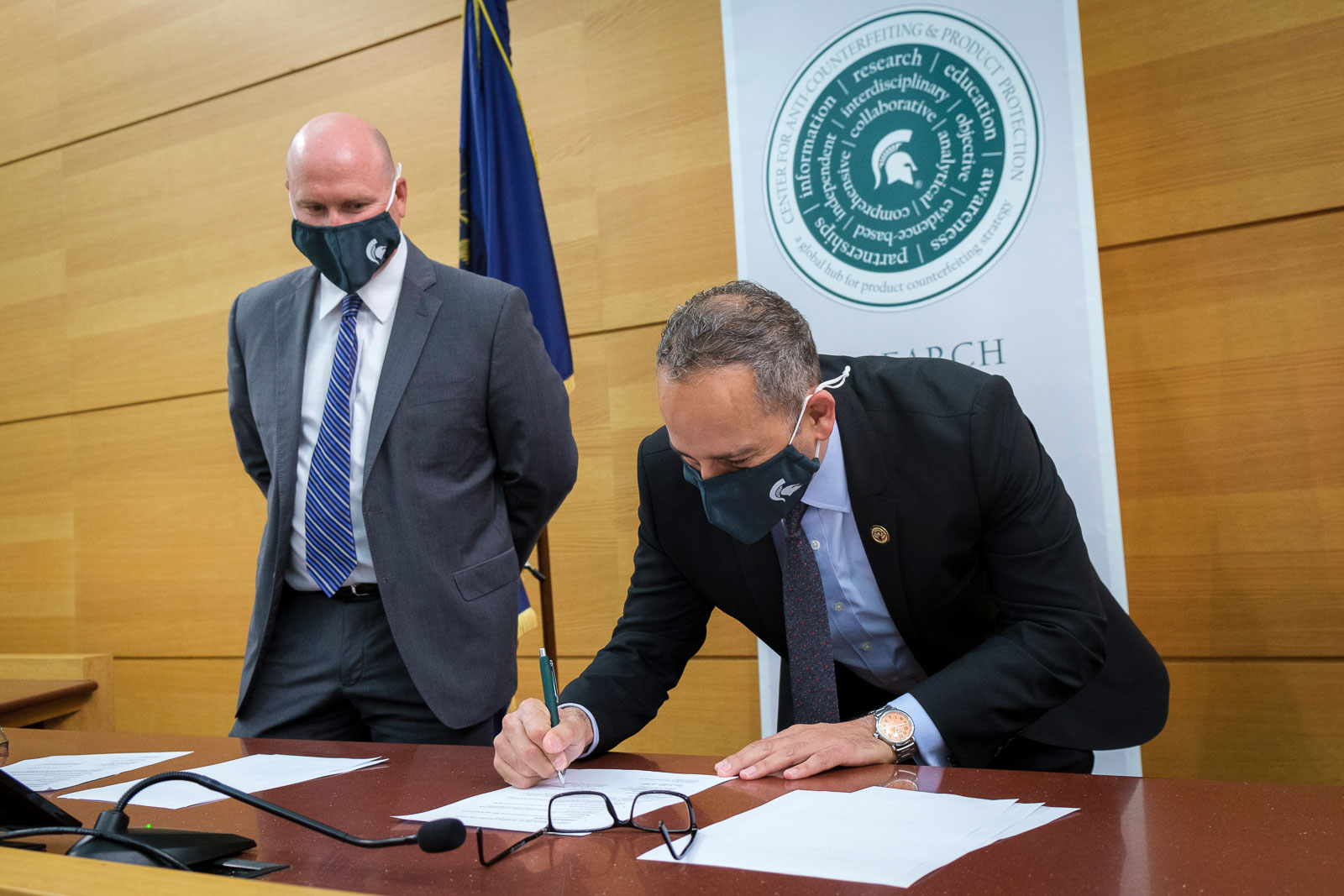 Jeff Rojek and Steve Francis sign an agreement between MSU ACAPP Center and IPR Center at the College of Law on August 27, 2020.