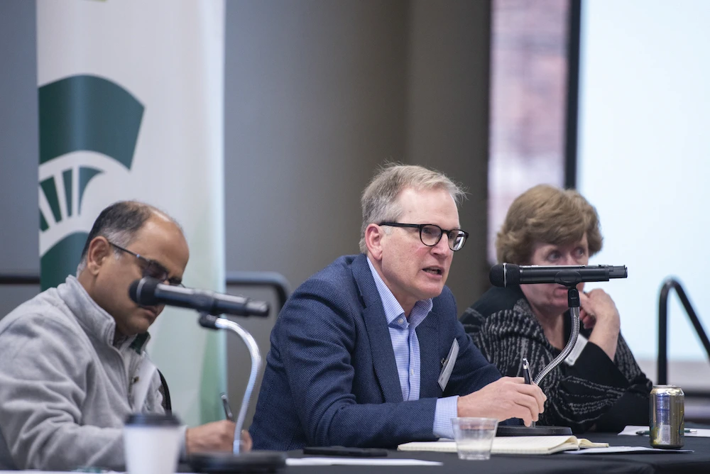 Professor Peter Berg, director of the School of Human Resources and Labor Relations, responds to an audience question during his panel on the topic of access to work.